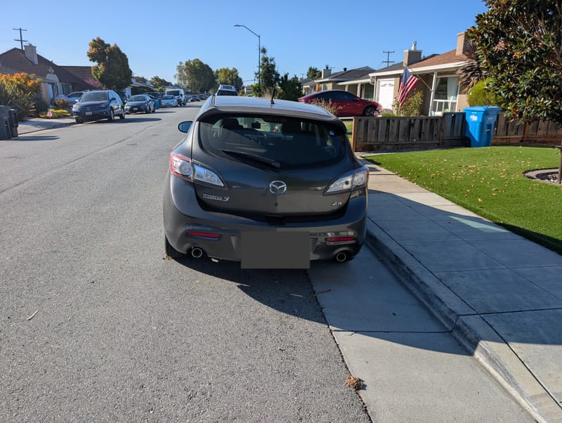 Rear view of the Mazda3, license plate blurred